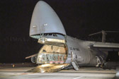 A solemn dignified transfer of remains is conducted upon arrival at Dover Air Force Base, DE, from the aircraft to a transfer vehicle to honor those who have given their lives in the service of our country. The vehicle then moves the fallen to the port mortuary.