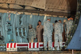 Air Force Staff Chaplin Lt. Col. Dennis Saucier leads prayer over the fallen.