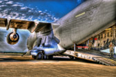 Time is 3:50 PM on August 29, 2011. The 'Dignified Transfer' return home of four heroes from  Operation Enduring Freedom – Afghanistan. Sgt. Devin J. Daniels of Kuna, ID,  Sgt. Colby L. Richmond of Providence, NC, Pfc. Jesse W. Dietrich of Venus, TX and Pfc. Brandon S. Mullins of Owensboro, KY.                Chaplin Col. Scott H. Jensen, US Army, Staff Chaplain, Air Force Mortuary Affairs Office leads prayers over the fallen along with Col. Thomas Kauth, US Air Force, Commander, 436th Maintenance Group, Dover AFB and Brig. Gen. Stephen R. Lyons, US Army, director for Operations and Logistics Readiness (G-43), Office of the Deputy Chief of Staff, G-4, Washington DC.