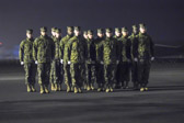 Two Marine carry teams stand ready