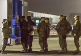 Marine carry team carries transfer case of Cpl. Jesse W. Stites.  to the mortuary transfer vehicle