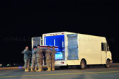 Carry team carries transfer case of Spc. Erica P. Alecksen to the mortuary transfer vehicle