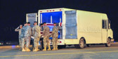 Carry team carries transfer case of Pfc. Alejandro J. Pardo to the mortuary transfer vehicle