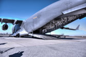 A dignified transfer is the process by which, upon the return from the theater of operations to the United States, the remains of fallen military members are transferred from the aircraft to a waiting vehicle and then to the port mortuary. The dignified transfer is not a ceremony; rather, it is a solemn movement of the transfer case by a carry team of military personnel from the fallen member's respective service. A dignified transfer is conducted for every U.S. military member who dies in the theater of operation while in the service of their country. A senior ranking officer of the fallen member's service presides over each dignified transfer.