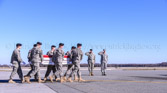 Dignified transfer officer orders “Present, Arms” (slow movement salute)