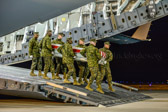 Marine Corps carry team carries transfer case of Sgt. Daniel M. Vasselian to the mortuary transfer vehicle
