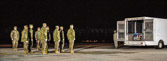 A dignified transfer is the process by which, upon the return from the theater of operations to the United States, the remains of fallen military members are transferred from the aircraft to a waiting vehicle and then to the port mortuary. The dignified transfer is not a ceremony; rather, it is a solemn movement of the transfer case by a carry team of military personnel from the fallen member's respective service. A dignified transfer is conducted for every U.S. military member who dies in the theater of operation while in the service of their country. A senior ranking officer of the fallen member's service presides over each dignified transfer.