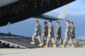 Carry team boards aircraft