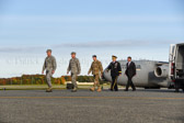 Dignified transfer officer, senior ranking officers  board aircraft.<br />Chaplain (Maj.) Melvin K. Smith, Air Force Mortuary Affairs Operation, Dover Air Force Base, DE, U.S. Air Force offers prayer for the fallen onboard the aircraft