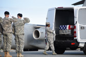 Transfer vehicle Door Attendant: Airman 1st Class Kenisha R. Robertson, slowly closes the doors to transfer vehicle.