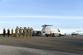 As the Transfer vehicle begins to pull away the Dignified transfer officer Col. Daniel F. Merry orders a final “Present, Arms” and “Order, Arms” (slow salute) as vehicle departs.
