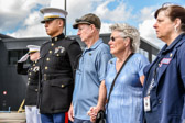 Captain Solivan with John Heise, Jeri Heise and USO volunteer Theresa Beckof