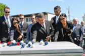 Cousin Sam Gabriel and family placing their carnations