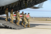 Army 'Old Guard' Fort Myer carry team carries transfer case of Sgt. 1st Class Michael J. Goble  to the mortuary transfer vehicle