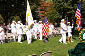 Gold Star Mother Marcy Cote' the National Flag guard leads in the Veterans of Foreign Wars National Guard