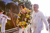 Vietnam PNP Gold Star Mother Terry Davis and Gold Star Mother Jennifer Jackman, 1st Vice-President place the wreath at the apex of The Wall.