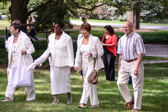 Gold Star Mother Mona Gunn, Barb Benard 2013-2014 Gold Star Mother National President and Gold Star Dad Jack Bernard arrive for the 73rd Anniversary “Gold Star Mothers Day” ceremonies at Arlington National Cemetery.