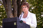 Barb Benard 2013-2014 Gold Star Mother National President address the audience.