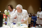 Imogene Cupp and Norma Luther start the placing of flowers for the fallen.