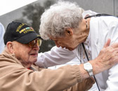 Just before the wreath laying along came a group of World War II Veterans on an Honor Flight from California.