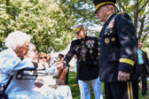 Marine Commandant General Robert B. Neller greeting Gold Star Mother Judith Young.