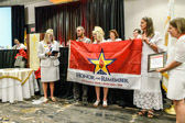 Sarah Whitledge Taylor, National Sgt-at-Arms, presenting the Honor and Remember flag to Lorna and Scott Harris proud parents of SPC Dustin J. Harris "Our Mighty Paratrooper" ~ KIA OIF  4/6/06    Bayji, Iraq