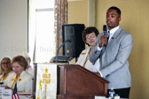 Naval cadet Cameron Kinley speaks to the Moms.