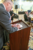 Then Lonnie LeGrand President of the Society of the Honor Guard, Tomb of the Unknown Soldier signs.