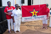 An Honor and Remember flag is presented to the Mother of SSG Tyrone G. Campbell.<br /><br />George Lutz is the founder of Honor and Remember, Inc., a non-profit organization dedicated to perpetually recognizing fallen military heroes and their families. He founded the organization after losing his son, Corporal Tony Lutz, in Iraq in 2005. The organization's primary mission is to establish the Honor and Remember Flag as a public national symbol to honor those who died in military service