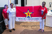 An Honor and Remember flag is presented to the Mother of SA Djiba A. Keita