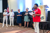 PNP Mona Gunn along with some of the other Moms put on a skit introducing their New challenge coin celebrating their upcoming 100 year anniversary.