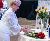 Chaplain, Sherrie McGhee closes the bible