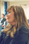 Tim’s beautiful wife looking on.
