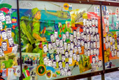 After his tour of duty, Derek tried to return to his other life as a graphic artist, without success. His mind kept taking him back to Vietnam and the haunting scenes he witnessed. His mind continually flashed back to an incident when he discovered the wallet of an enemy KIA contained a picture of a wife, or loved one, someone who would mourn his loss. Diagnosed with PTSD, he was eventually granted a TPI pension. During a PTSD clinic at the Adelaide Repatriation Hospital the psychologist advised Derek to put his views onto canvas as a form of therapy. After some early sketches that featured just a few of the 508 it developed into a larger work. This picture was not meant to be seen outside of his closest friends, but those who were given the opportunity begged Derek to continue this work, so that from a canvas 21 inches by 36 it grew into 12 panels that bolt together to measure 11 meters, that is still a “work in progress” that shows our involvement in Vietnam.