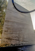 The northern stele has fixed to it a series of quotations in stainless steel lettering. The designers originally suggested half a dozen quotations which they thought would add to the interior and lessen the impact of blank walls. The committee agreed with the idea but wanted more than six so they called for suggestions from veterans and from the many submissions selected 34 which preserve the language and slang of the war. No attribution for the inscriptions is provided on the wall as the assessors felt that this best served the sense of the consistent and equal value to be placed upon each quotation. Each letter is made of 3mm gauge stainless steel, 65mm high using a Futura typeface.