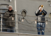 Marty Seroter and Greg Murphy playing taps, echo taps.