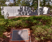 "THE OTHER WALL"<br />It does not stand in Washington<br />By others of its kind<br />In prominence and dignity<br />With mission clearly defined.<br />It does not list the men who died<br />That tyranny should cease<br />But speaks in silent eloquence<br />Of those who came in peace.<br />This Other Wall is solemn white<br />And cut in simple lines<br />And it nestles in the splendor<br />Of the Carolina pines.<br />And on this wall there are the names<br />Of men who once had gone<br />In friendship’s name offer aid<br />To Beirut,Lebanon<br />They did not go as conquerors<br />To bring a nation down<br />Or for honor or for glory<br />Or for praises or renown.<br />When they landed on that foreign shore<br />Their only thought in mind<br />Was the safety of its people<br />And the good of all mankind<br />Though they offered only friendship<br />And freedom’s holy breath<br />They were met with scorn and mockery<br />And violence and death.<br />So the story of their glory<br />Is not the battles fought<br />But of their love for freedom<br />Which was so dearly bought.<br />And their Wall shall stand forever<br />So long as freedom shines<br />On the splendor and the glory<br />Of the Carolina pines.<br />Written by: R.A. Gannon