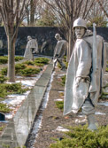 Three of the statues are in the woods, so if you are at the flagpole looking through the troops, you can't tell how many there are, and could be legions emerging from the woods.