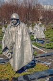 Upon close inspection, you will see that all of the images look straight out from the wall over the platoon of statues; the soldiers they were there to support.