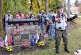 'Graves' leads those in attendance with the Pledge of Allegiance.