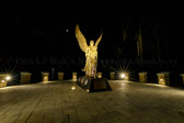 The Angel is lifting off into the sky carrying the Body of the service member.