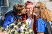 Former World War II POW  Carmel Whetzel gets a kiss from the  pretty girls