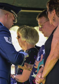 Spent cartridges from the 21 gun salute were also presented to the surviving family members.