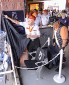 Unveiling of the POW-MIA National Chair of Honor by Marine John J. Murphy, Iwo Jima survivor and Vietnam Army Medic Michael “Doc” Spresser.