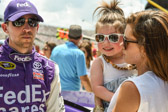 James Dennis Alan "Denny" Hamlin (born November 18, 1980) FedEX professional race car driver. He drives the No. 11 Toyota Camry for Joe Gibbs Racing in the Sprint Cup series.