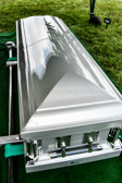 Members of Rolling Thunder® Inc. placed the POW-MIA beads on the casket of PFC Robert Junior Carter.