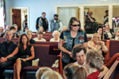 Art's wife Molly enters the memorial chapel