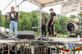 Rolling Thunder National President Joe Bean thanks Harley Davidson Motor Company and Aetna for their checks.