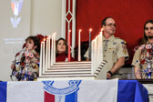 His father, grandfather and brother Brandon are also Eagle Scouts.