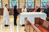 St. Francis Country House Chaplin Father Edward Kennedy saying prayers for the repose of the soul of Sargent Major Alfred L. DeSerio